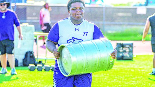 Wildcats add linemen challenges to summer workouts