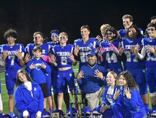 The Bastrop Tribe Warriors rejoice in another state championship, prolonging the program’s status as a six-man football dynasty. Photo by Quinn Donoghue