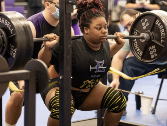 Nya Kirk Jones – one of the best powerlifters in the state – showcases her incredible strength. Photo by Erin Anderson