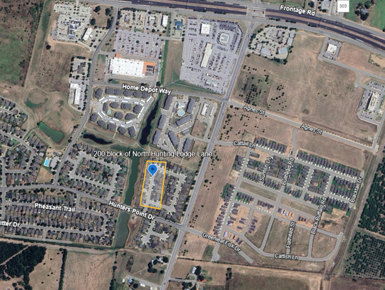 Armed garage standoff ends in surrender, arrest