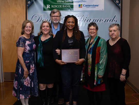 BCLTRT executive director Sheila Lowe (middle) accepts the Non-Profit of the Year award with friends and colleagues. Photo courtesy of Bastrop Chamber of Commerce.