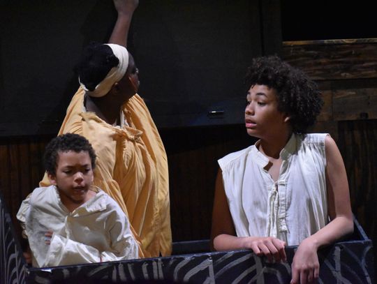 Obie and Amos hide to avoid danger along with Joe – a runaway slave played by Allyah Howard. Photo by Quinn Donoghue