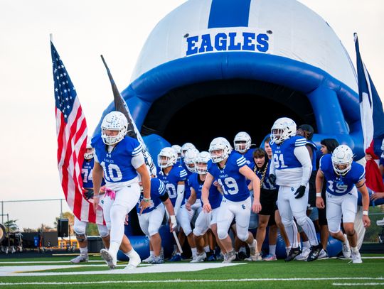 The Cedar Creek High School varsity football team takes the field Friday, Sept. 15 prior to the Eagles' home game versus Elgin High School held at Bastrop Memorial Stadium. Photo courtesy of Bastrop ISD