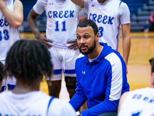 Cedar Creek High School boys varsity basketball Head Coach Valentino Maxwell talks with his team during a timeout Nov. 30, 2023, during the Eagles’ home tournament game versus Round Rock Westwood High School. Photo courtesy of Bastrop ISD