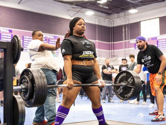 Nya Kirk Jones showcases her power during the deadlifts at the Jan. 28 meet in Elgin.  Photo by Erin Anderson