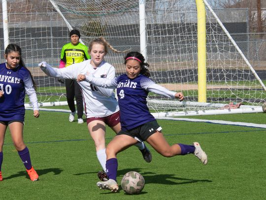 Elgin High School girls varsity soccer junior Maria Yanez (9) boots the ball downfield Jan. 20 against Princeton High School during the Lady Wildcats’ match at the Governor’s Cup tournament hosted by Georgetown High School. Photo by Marcial Guajardo