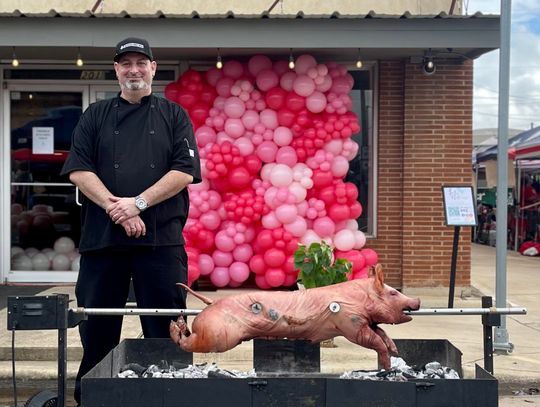 Pat O’Brien with Firewild On Main during this year’s Hogeye Festival, whose roasted pork was donated to a local soup kitchen. Photo by Niko Demetriou