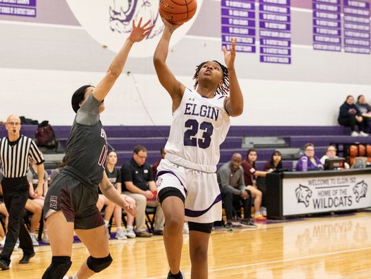 Natasha Stafford rises to the rim for a transition layup. Photo by Erin Anderson