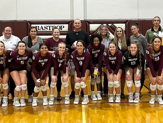 The Bastrop High School varsity volleyball team shows appreciation for teachers on Aug. 29 prior to the Lady Bears’ home match against Lockhart High School. Photo courtesy of Morgan Rollins