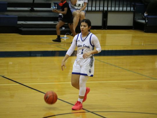 Cedar Creek High School girls varsity basketball junior Elisah Sanchez (1) dribbles the ball upcourt Nov. 14 during the Lady Eagles 70-20 home victory against Austin Travis Early College High School. Photo by Hopie Almendarez Sosa