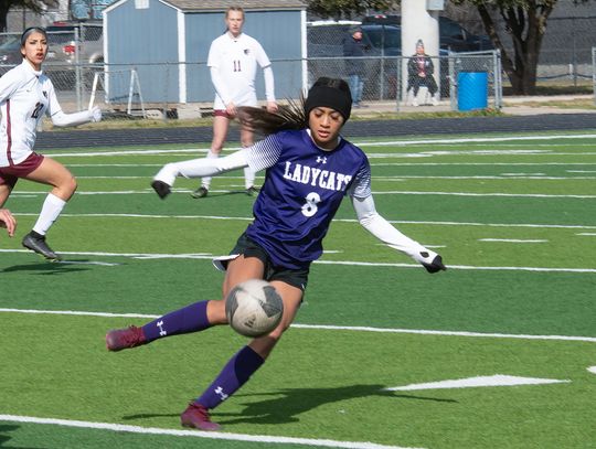 Elgin High School girls varsity soccer junior Kailyn Cook dribbles the ball Jan. 20 during the Lady Wildcats’ match against Princeton High School at the Ladies Governor’s Cup tournament held in Georgetown. Photo by Marcial Guajardo / Elgin ISD