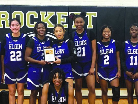 The Elgin High School girls varsity basketball team proudly poses after placing second at the Crockett High School tournament in Austin. Photo courtesy of Elgin ISD