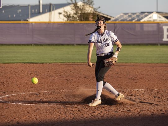 Elgin pitcher Jessica Cantrell delivering a strike to the batter standing at the plate. Photo by Erin Anderson