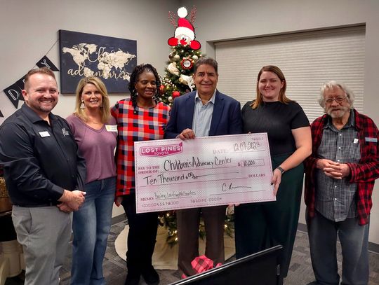 CAC Board Treasurer Eric Farley, CAC Board President Val Butcher, community member Sumai Lokumbe, Lost Pines Toyota Dealer Principal Carlos Liriano, CAC Executive Director Meagan Webb and Director of the Honor Choir Bill Owens with the sizable donation. Photo courtesy Lost Pines Toyota 