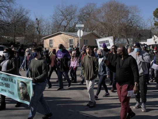 Representatives from Elgin helped lead the way during the first section of Bastrop County’s annual Martin Luther King, Jr. Holiday Walk in Bastrop on Monday morning. Photo by Julianne Hodges   Photo by Julianne Hodges