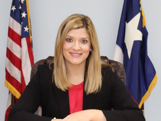 Municipal judge reappointed, sees pay bump