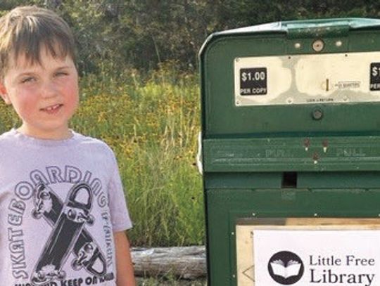 News rack becomes lending library