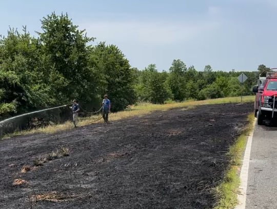 Roadside blaze rapidly contained