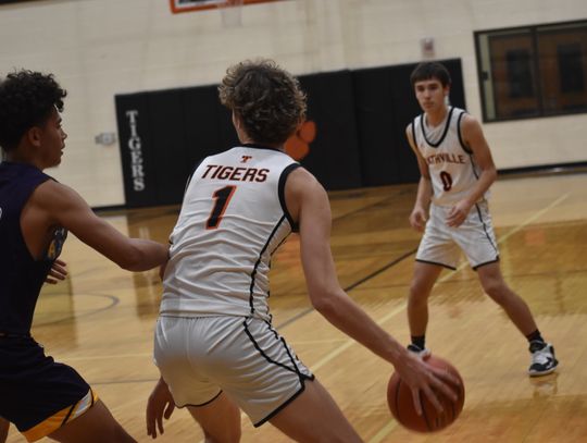 Joseph Mokry backs down a La Grange defender before swinging the ball to one of his teammates. Photo by Quinn Donoghue