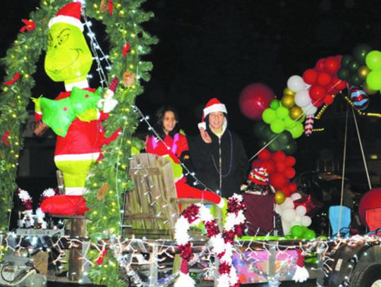 Similar to last year, parade floats and entries will have Christmas lights shiny and bright as they walk the route through downtown Elgin. File photo