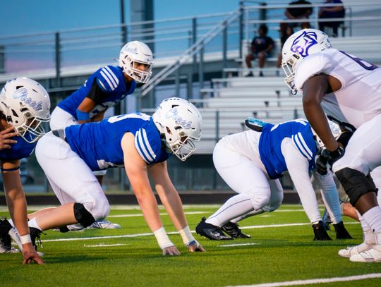 The Elgin High School and Cedar Creek High School varsity football teams square off on Friday, Sept. 15 as the Wildcats defeated the host Eagles 64-14 at Bastrop Memorial Stadium. Photo courtesy of Bastrop ISD