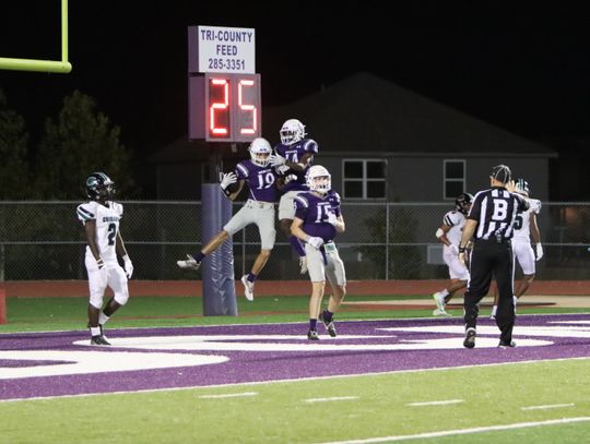 Elgin High School varsity football senior wide receiver Blake Courtney (19) celebrates with sophomore wide receiver Gary Jefferson Jr. (14) and junior wide receiver Blake Thames (15) following a touchdown on Sept. 22 during the Wildcats’ 50-28 victory at home vs. Pflugerville Connally High...