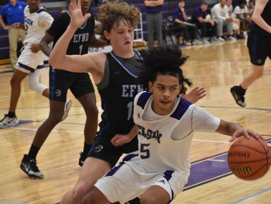 Marcus Hickman spins out of traffic near the baseline to reset on offense. Photo by Quinn Donoghue