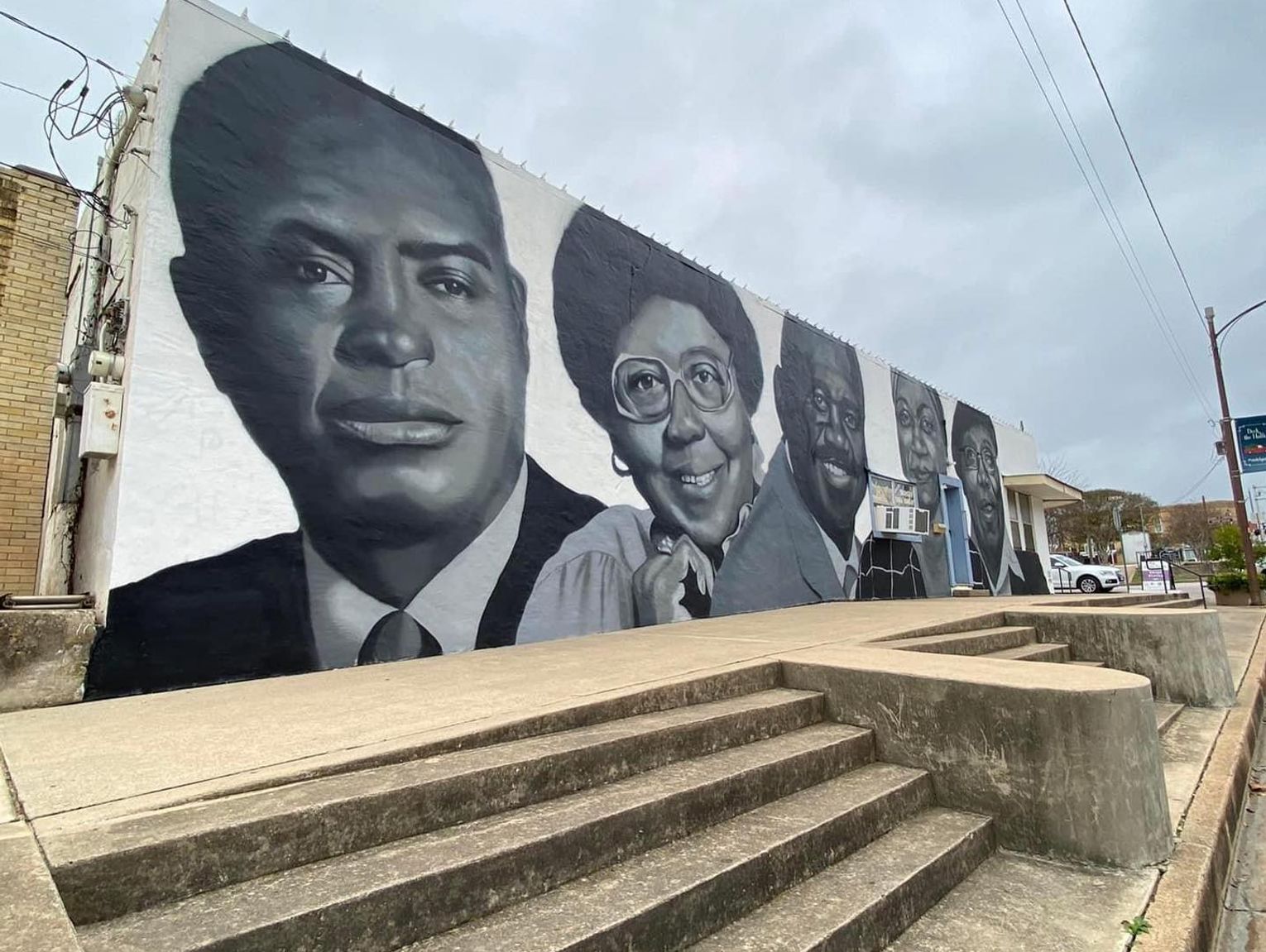 Black icons go on mural