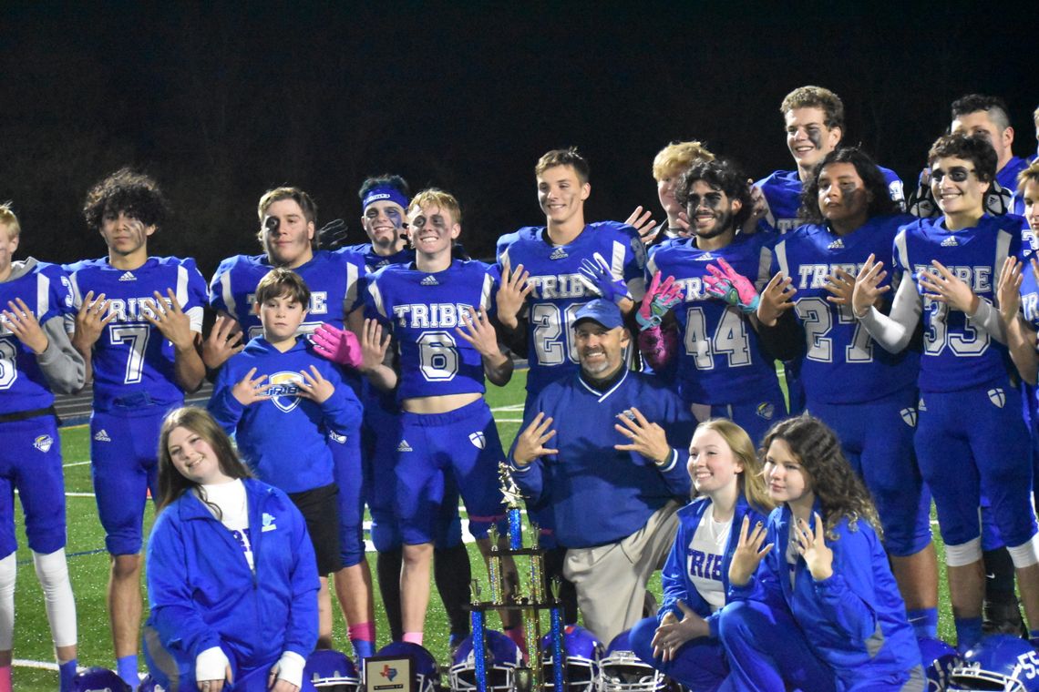 The Bastrop Tribe Warriors rejoice in another state championship, prolonging the program’s status as a six-man football dynasty. Photo by Quinn Donoghue