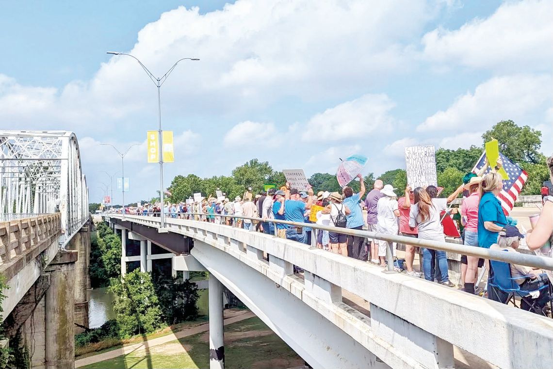 Activists flood Bastrop bridge