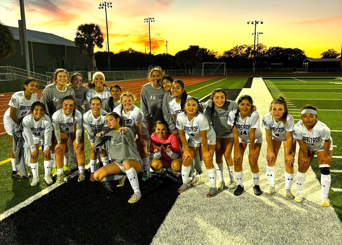 The Bastrop High School girls varsity soccer team happily poses together Friday, Jan. 12 following the Lady Bears’ dominant 7-0 victory over TMI Episcopal at the Gulf Coast Classic tournament hosted by Rockport-Fulton High School. Photo courtesy of Bastrop ISD