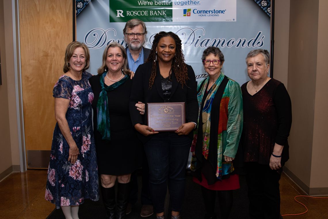 BCLTRT executive director Sheila Lowe (middle) accepts the Non-Profit of the Year award with friends and colleagues. Photo courtesy of Bastrop Chamber of Commerce.