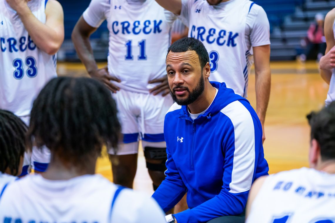 Cedar Creek High School boys varsity basketball Head Coach Valentino Maxwell talks with his team during a timeout Nov. 30, 2023, during the Eagles’ home tournament game versus Round Rock Westwood High School. Photo courtesy of Bastrop ISD