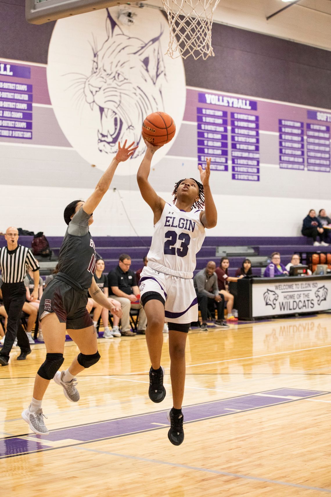 Natasha Stafford rises to the rim for a transition layup. Photo by Erin Anderson