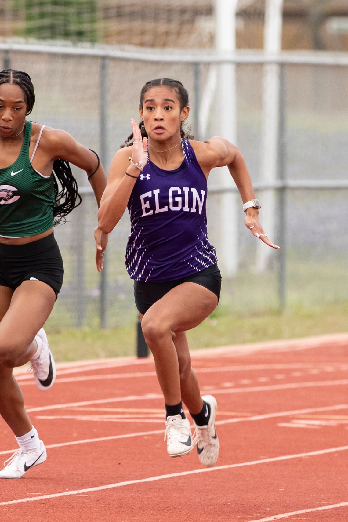 Kaylin Cook picks up a silver medal for her team in the 4x100-meter relay. Photo by Erin Anderson