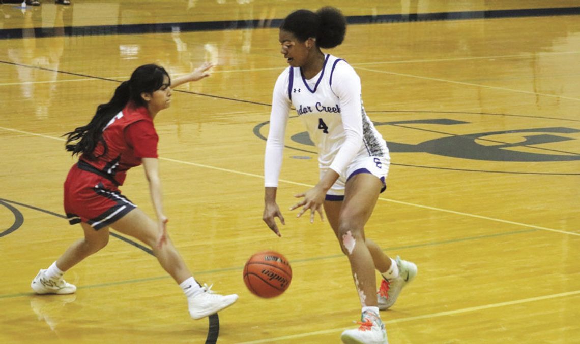 Cedar Creek High School girls varsity basketball sophomore Keyaira Limuel Washington drives to the basket Nov. 14 during the Lady Eagles’ dominant 70-20 victory at home over Austin Travis Early College High School. Photo by Hopie Almendarez Sosa