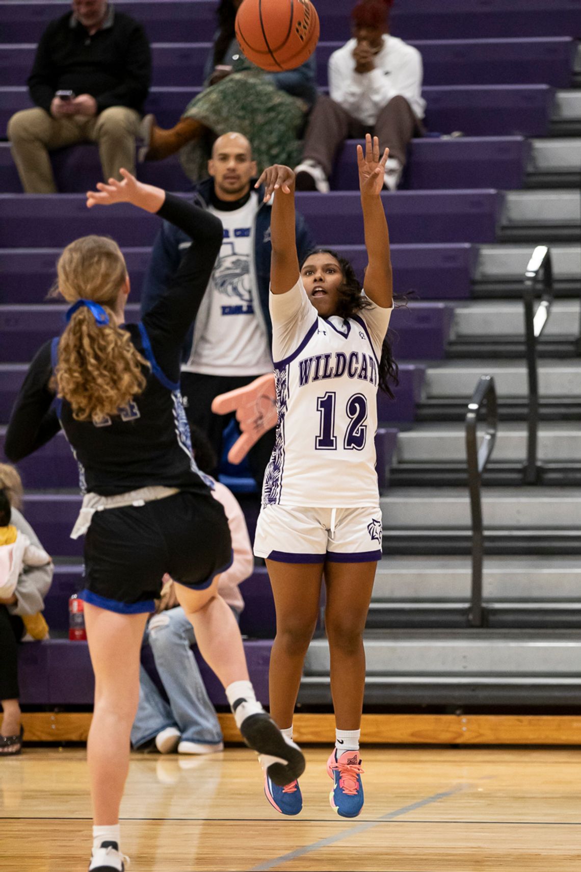 Elgin High School girls varsity basketball sophomore Trinity Martinez shoots a three-pointer Jan. 9 during the Lady Wildcats’ 47-17 district home victory over Cedar Creek High School. Photo by Erin Anderson