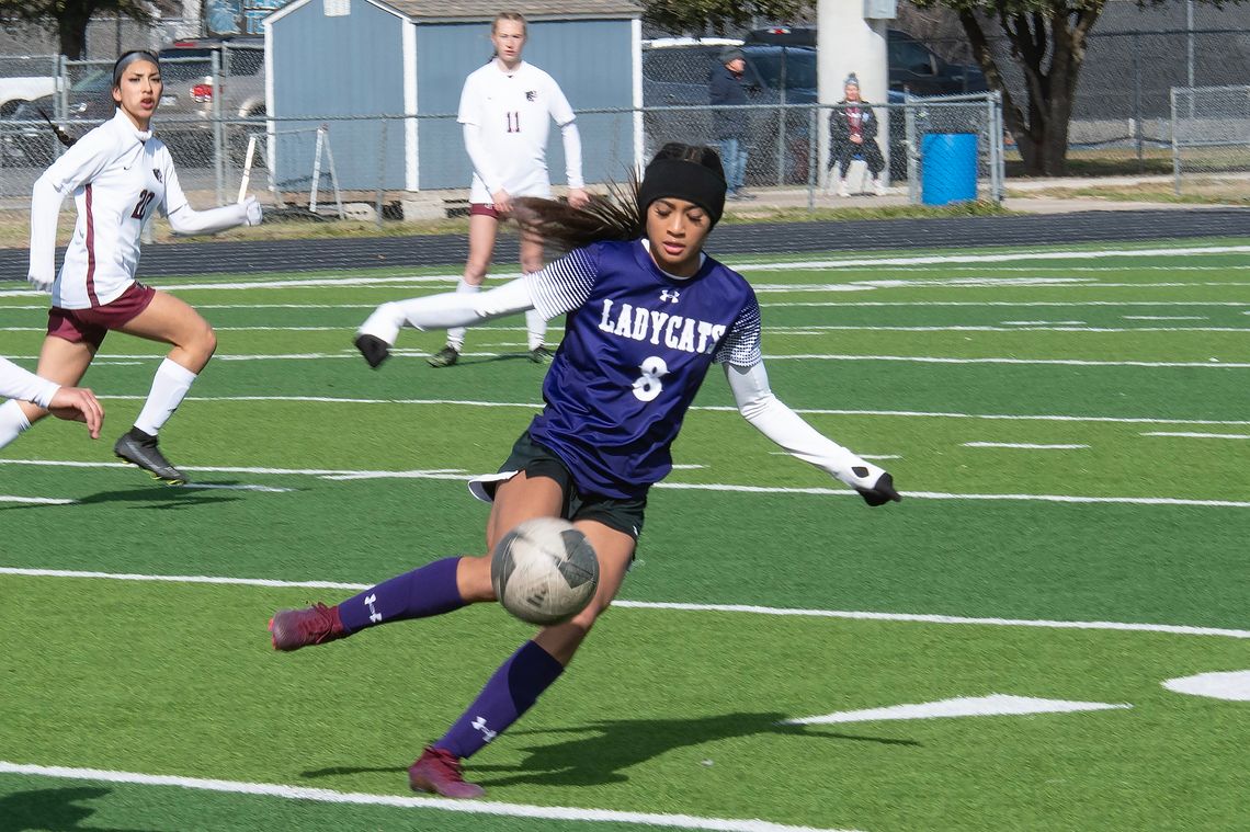 Elgin High School girls varsity soccer junior Kailyn Cook dribbles the ball Jan. 20 during the Lady Wildcats’ match against Princeton High School at the Ladies Governor’s Cup tournament held in Georgetown. Photo by Marcial Guajardo / Elgin ISD