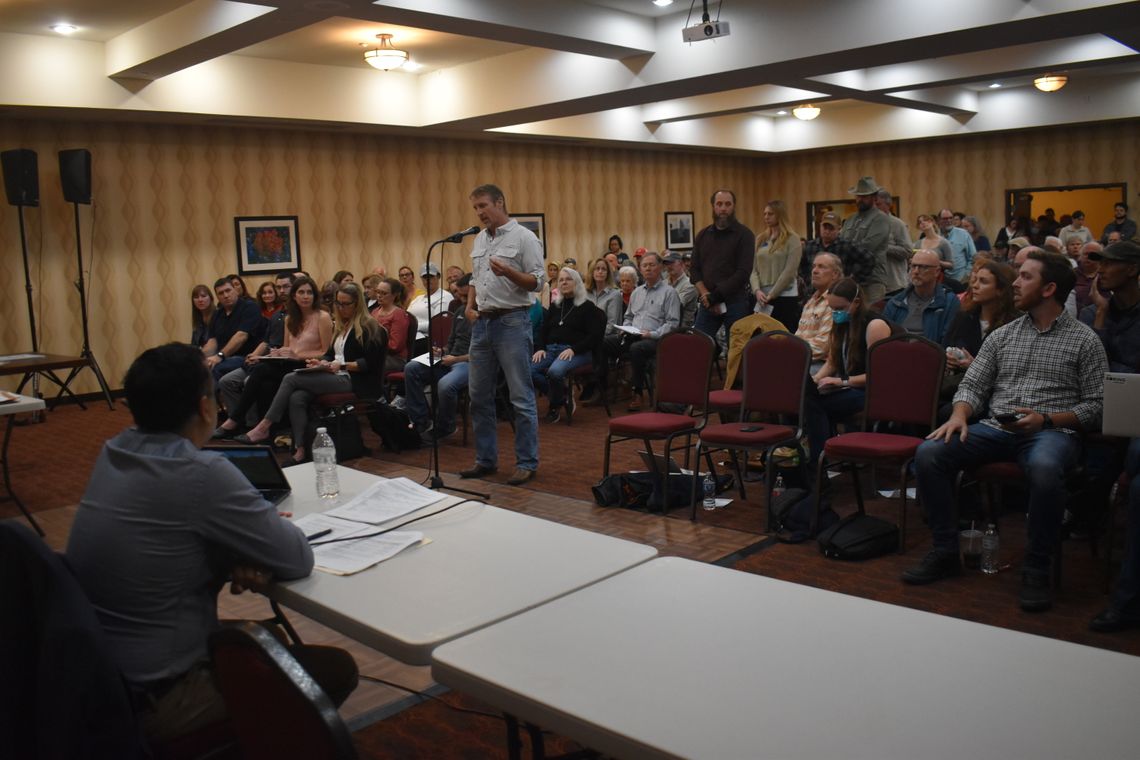 Rajiv Y. Patel, Green Think Consulting managing engineer, sits as he listens to questions from concerned residents at a Texas Commission on Environmental Quality meeting in Bastrop March 21   Photo by Fernando Castro