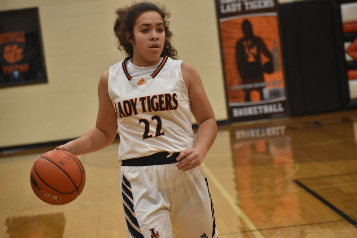 Arabella Gutierrez sets up the offense at the top of the key. Photo by Quinn Donoghue