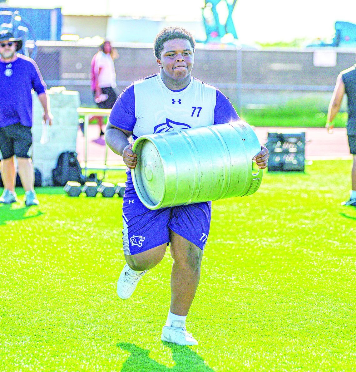 Wildcats add linemen challenges to summer workouts