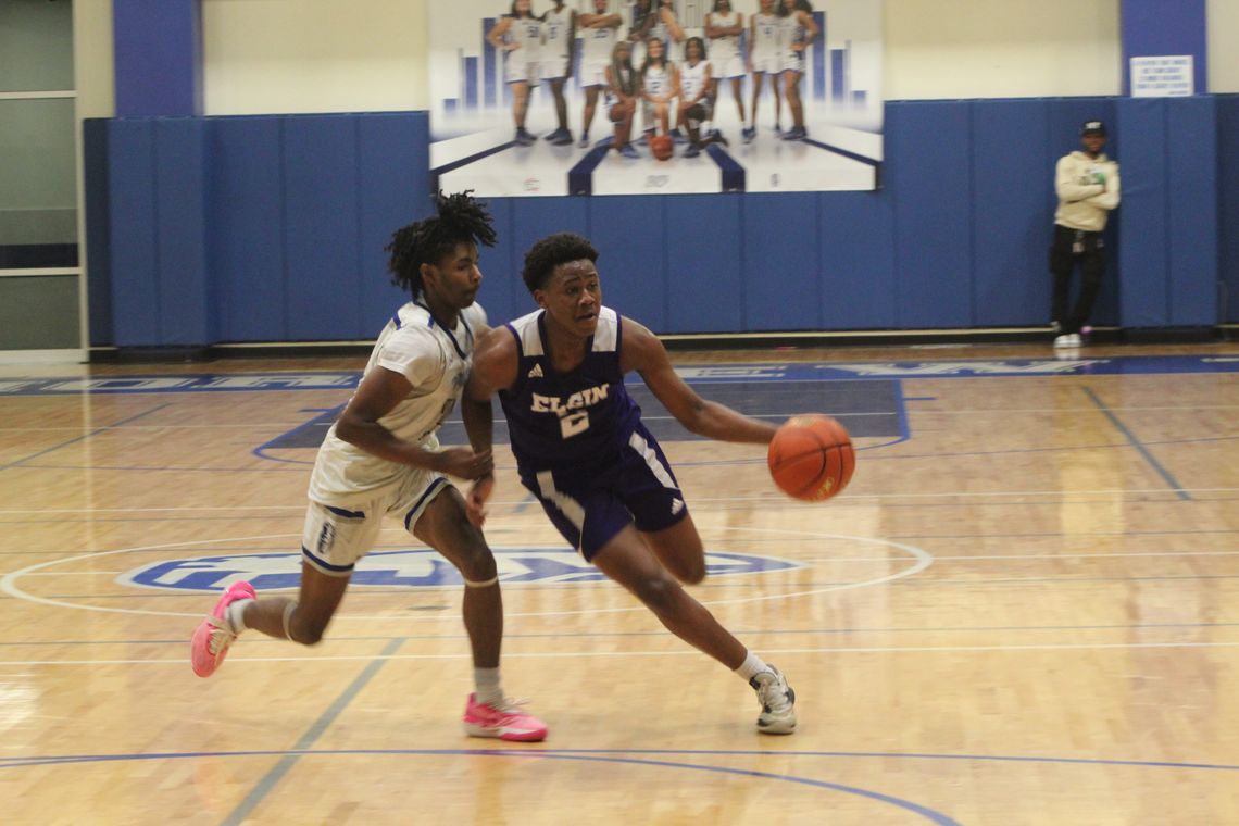 Elgin High School boys varsity basketball junior Amar Bermudez drives to the basket for a score Friday, Dec. 15 during the Wildcats’ 50-44 victory on the road against Manor New Tech High School. Photo by Andrew Salmi