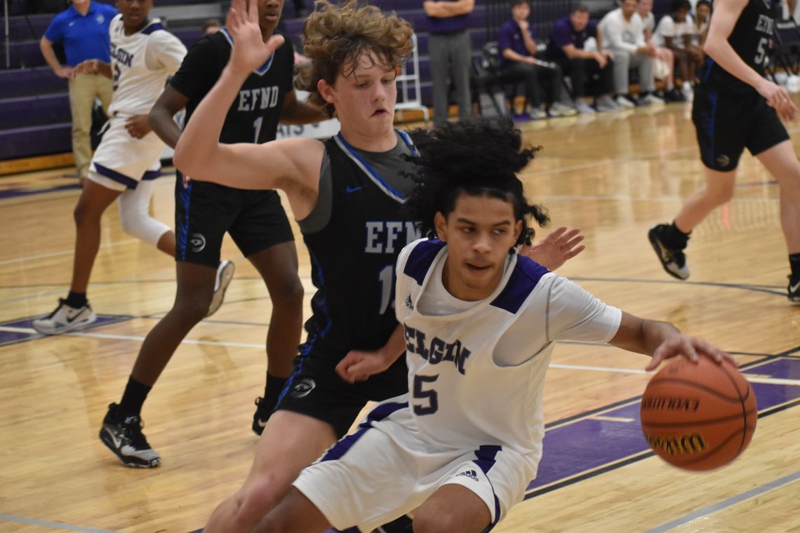 Marcus Hickman spins out of traffic near the baseline to reset on offense. Photo by Quinn Donoghue