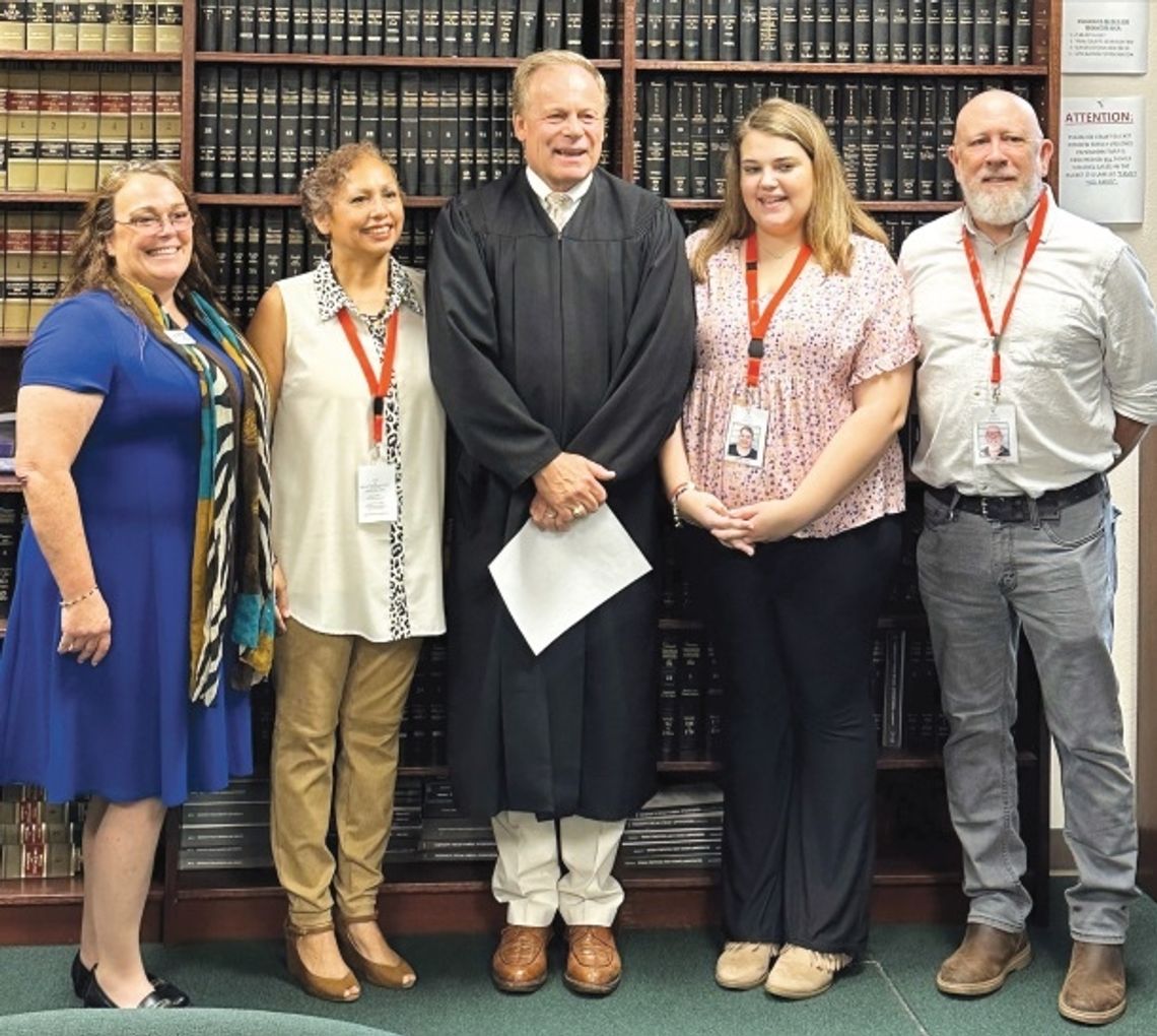 Brandy Martin, Esther Montoya, Judge Benton Eskew, Sabrina Bass and Chris Ligon, now part of the CASA family. Photo courtesy of Rita Coduto