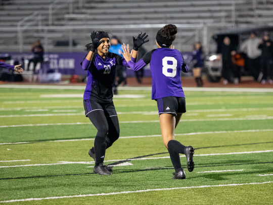 Dory Estra (left) and Kailyn Cook (right) come together after a Wildcats goal. Both players will return as key pieces in 2023. Photo courtesy of Taylor Cansler