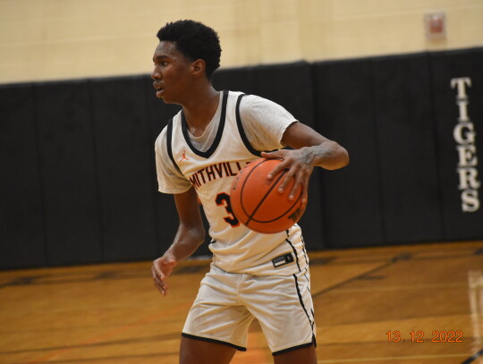 Jacoby Brown prepares to make his move on a drive to the basket. Photo by Quinn Donoghue