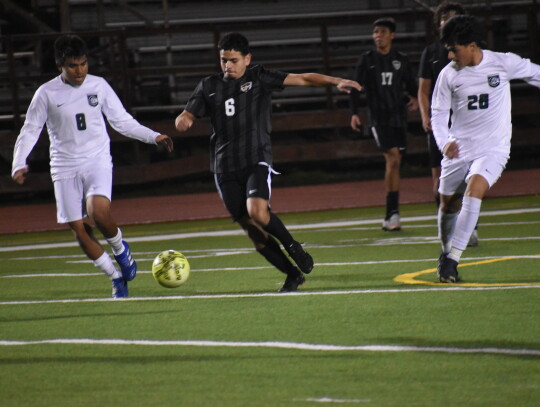 Josue Cervantes charges down field, leading an aggressive offensive attack for the Bears. Photo by Quinn Donoghue