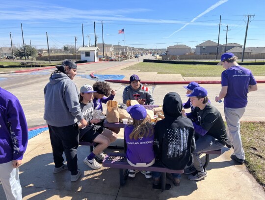 Elgin ISD students enjoy a free curbside lunch at Elgin High School. Photo courtesy of Dr. Jana Rueter