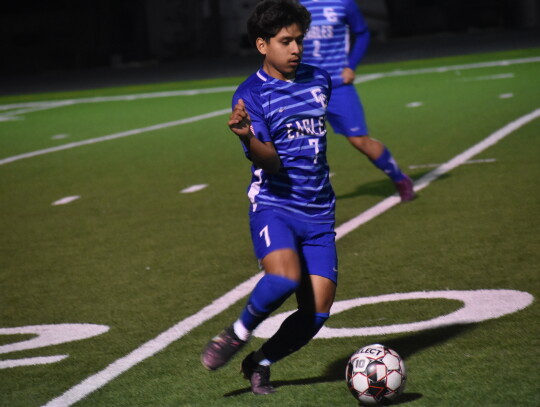 Nico Chavez displays some crafty ball-handling to advance downfield in Friday night’s game versus Hendrickson. Photo by Quinn Donoghue