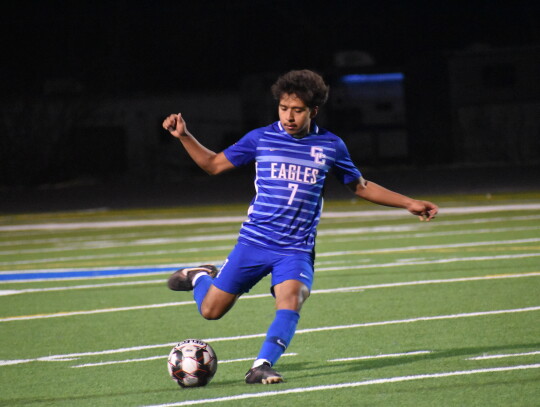 Nico Chavez surveys the field before making an open-field pass to one of his teammates. Photo by Quinn Donoghue